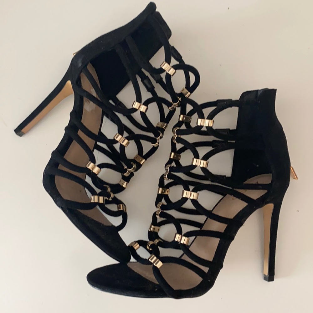 Gold and black caged heels